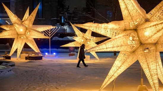 8. Toronto in Canada - The star lights in Old Montreal in Montreal, Quebec, Canada are a visual treat as the snow comes down while Toronto's annual Christmas market in historic Distillery District is one of the biggest in North America with its dazzling 50-foot Christmas tree, glittering lights, a Santa's Grotto, fairground rides, beer gardens etc.&nbsp;(Photo by ANDREJ IVANOV / AFP)